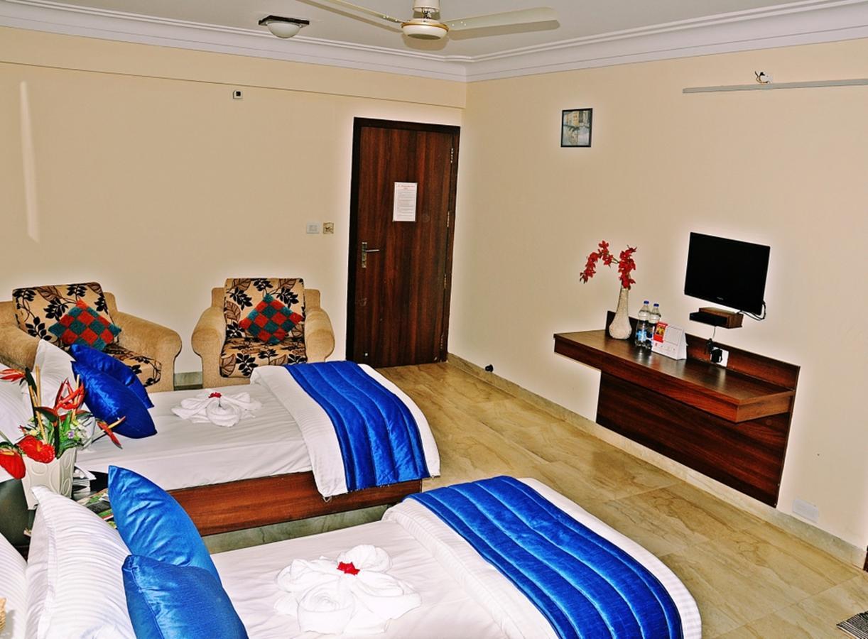 Hotel Mookambika Palace Kolluru Bagian luar foto